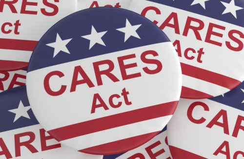 Pile of CARES Act Buttons With US Flag, 3d illustration