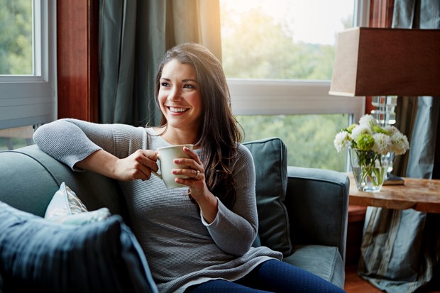 Somfy - woman drinks cup of coffee